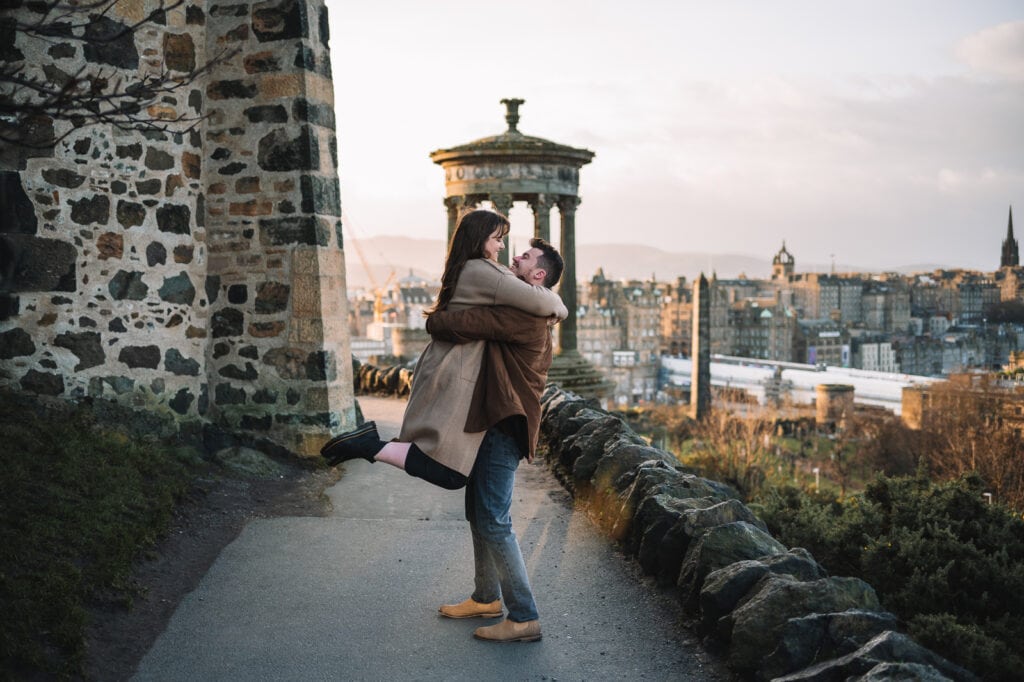 Couple embracing near Calton Hill viewpoint
