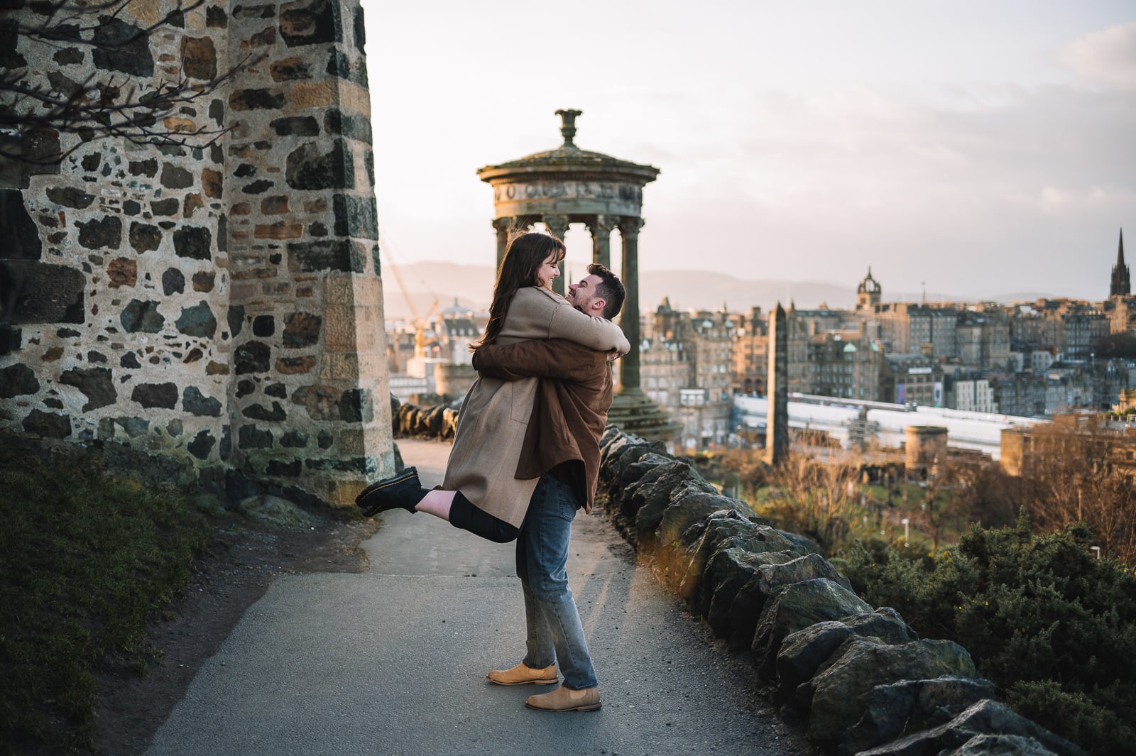 clay and olivia proposal at calton hill edinburgh