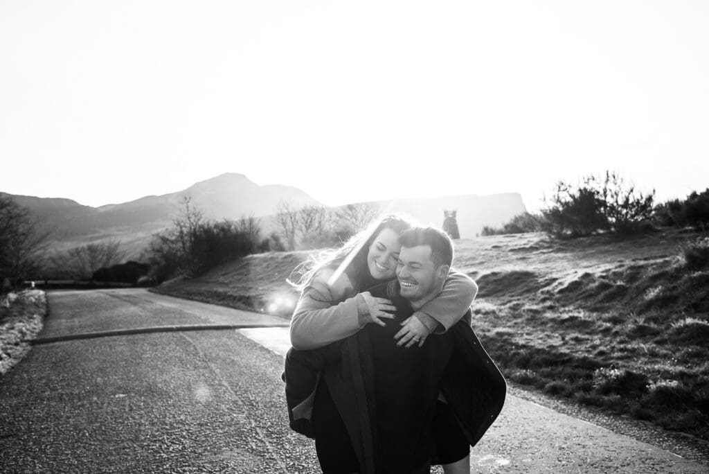 clay and olivia proposal at calton hill edinburgh