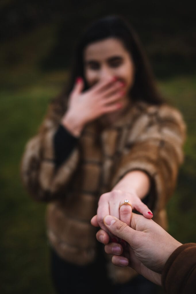 Close-up of hands reaching together in playful moment