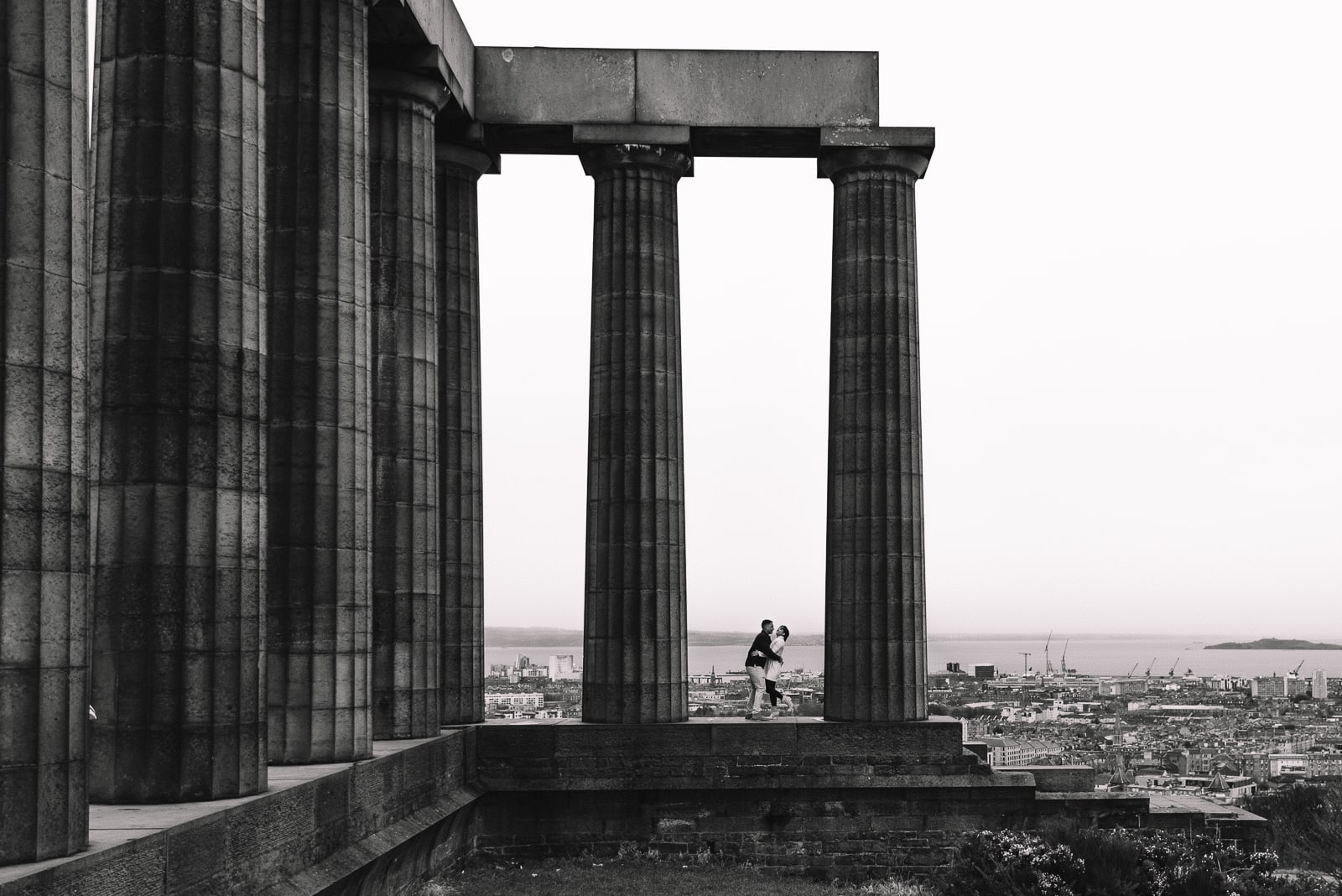 bailey and ro edinburgh engagement shoot at calton hill national monument of scotland