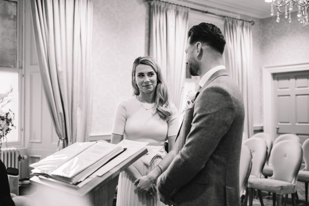 Wedding ceremony taking place at edinburgh city chamebrs