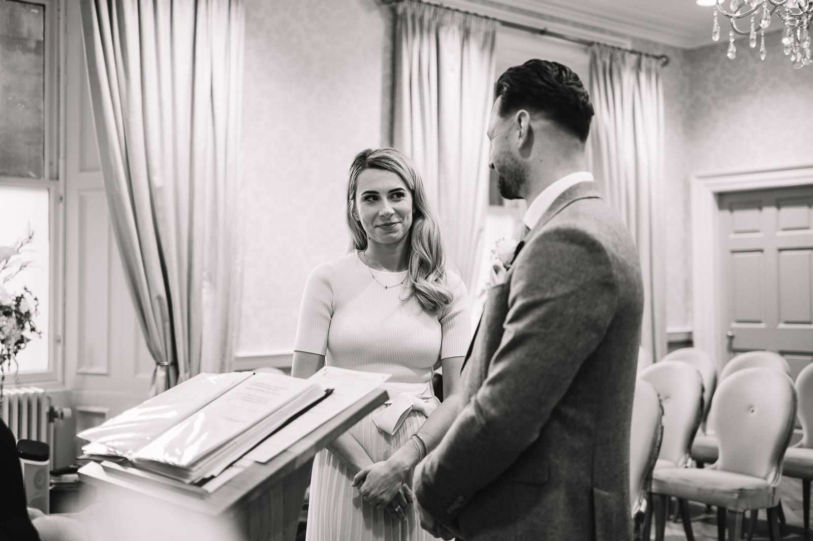 Wedding ceremony taking place at edinburgh city chamebrs
