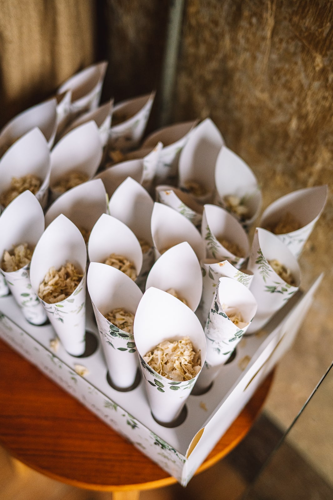 Paper confetti cones arranged for wedding guests