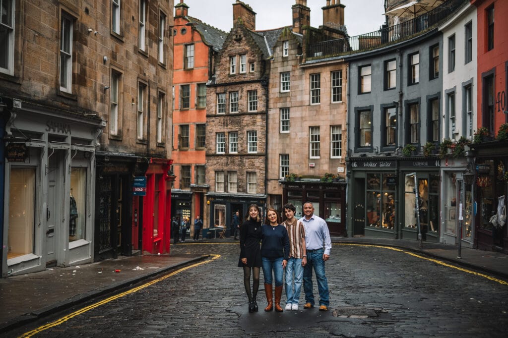 family walking through Edinburgh Old Town street
