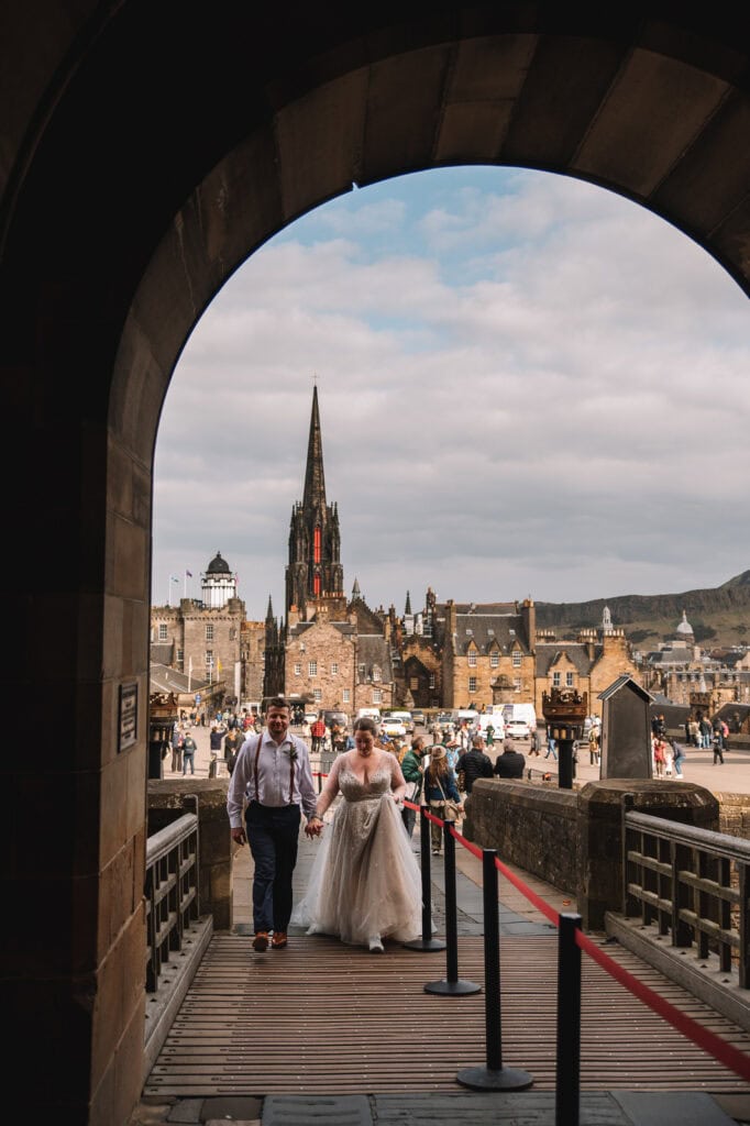 View through archway toward Edinburgh skyline and Scott Monument