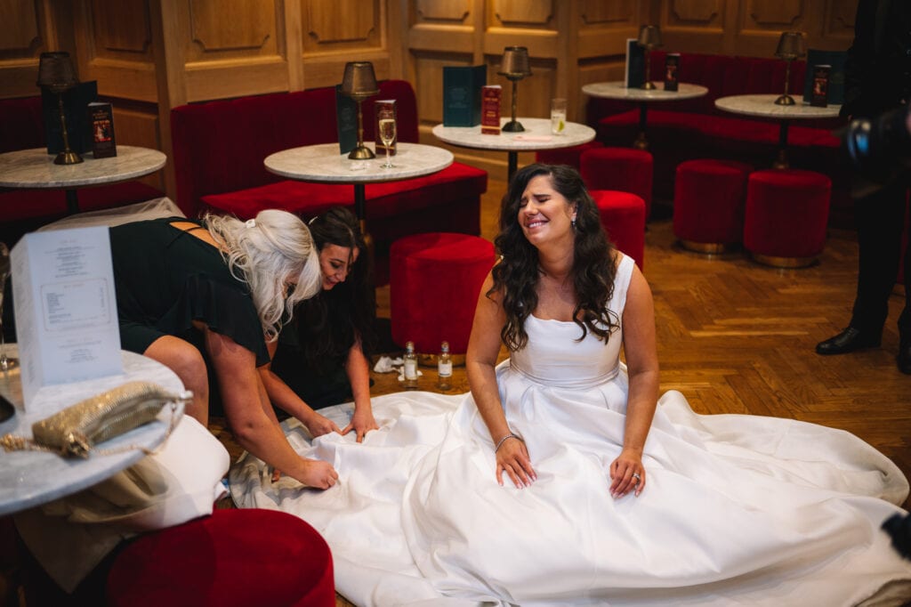Bride smiling during wedding reception preparations