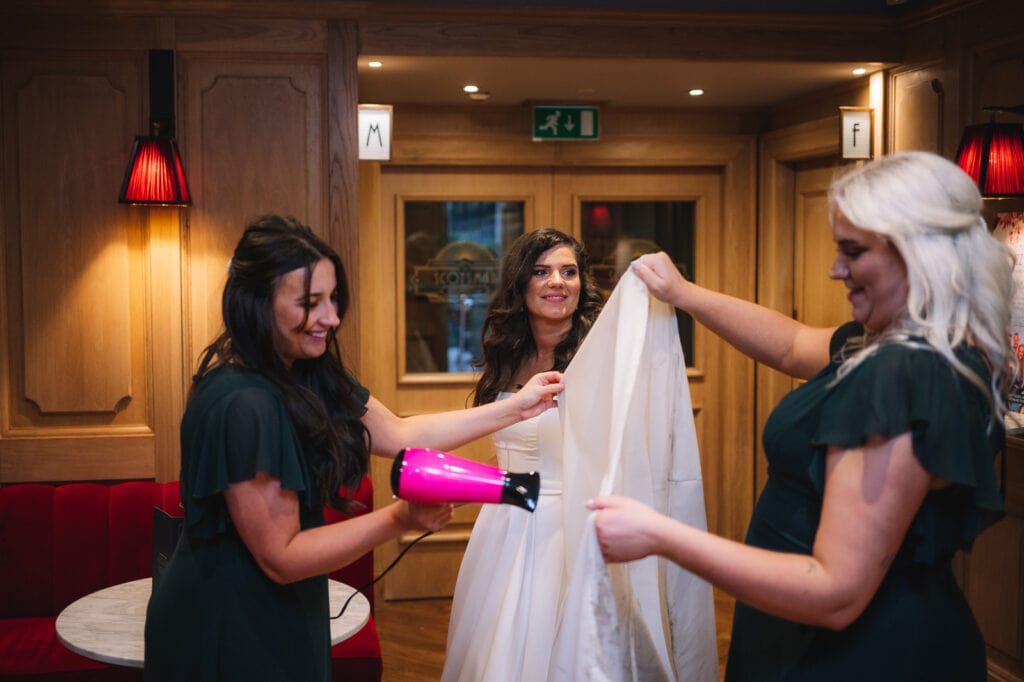 Bride smiling during wedding reception preparations