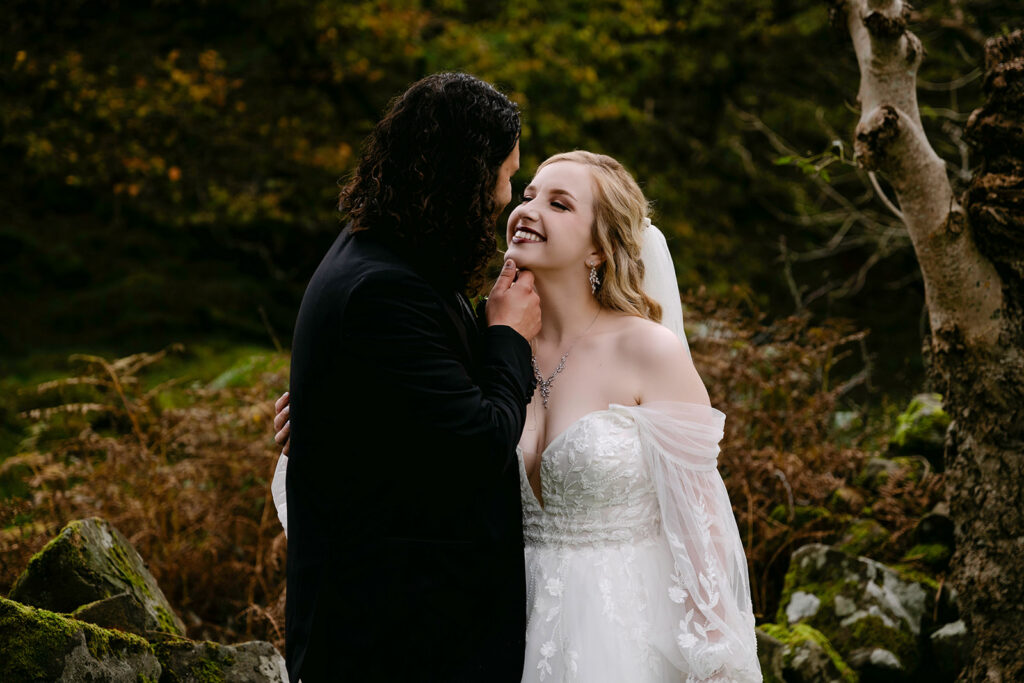 Couple sharing joyful moment together in natural outdoor setting.