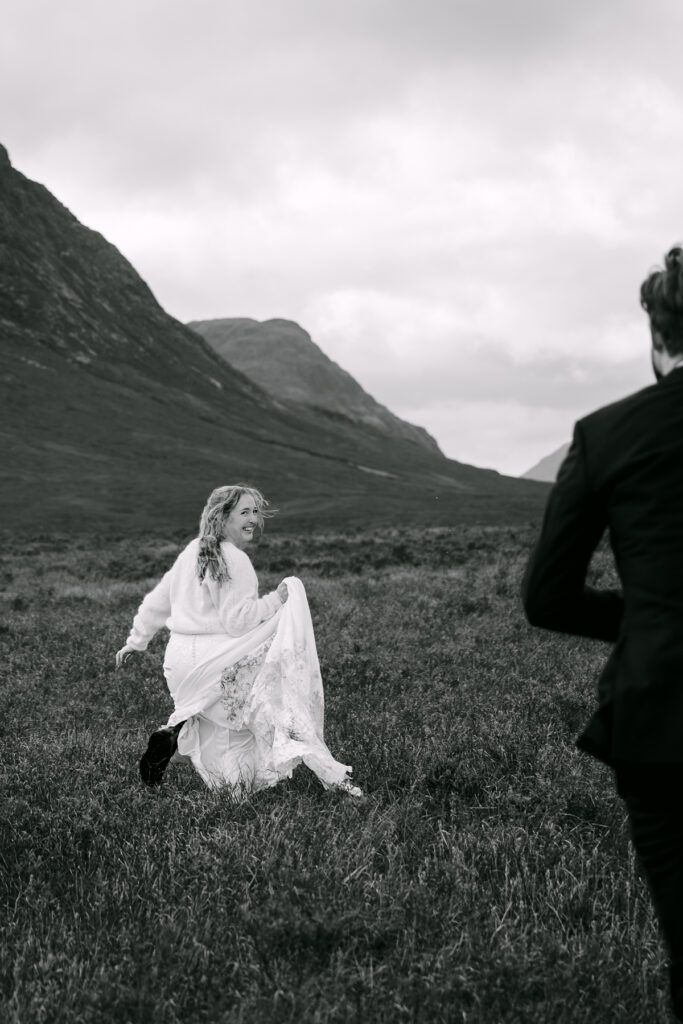 bride runes playfully away from groom in glencoe