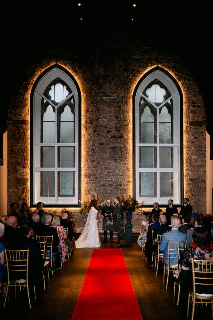 couple marries in greyfriar's church at virgin hotels