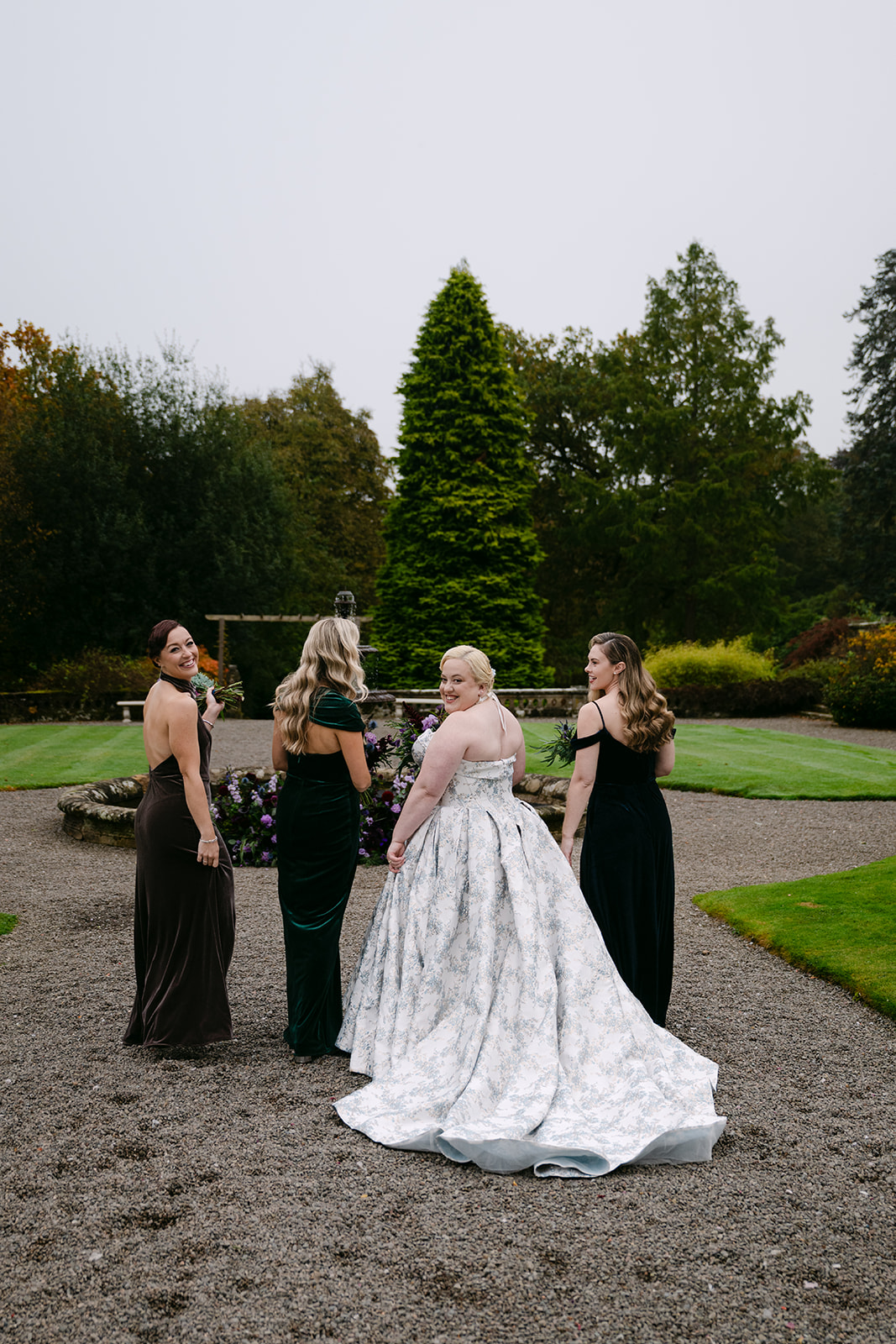 bride and bridesmaids walk away