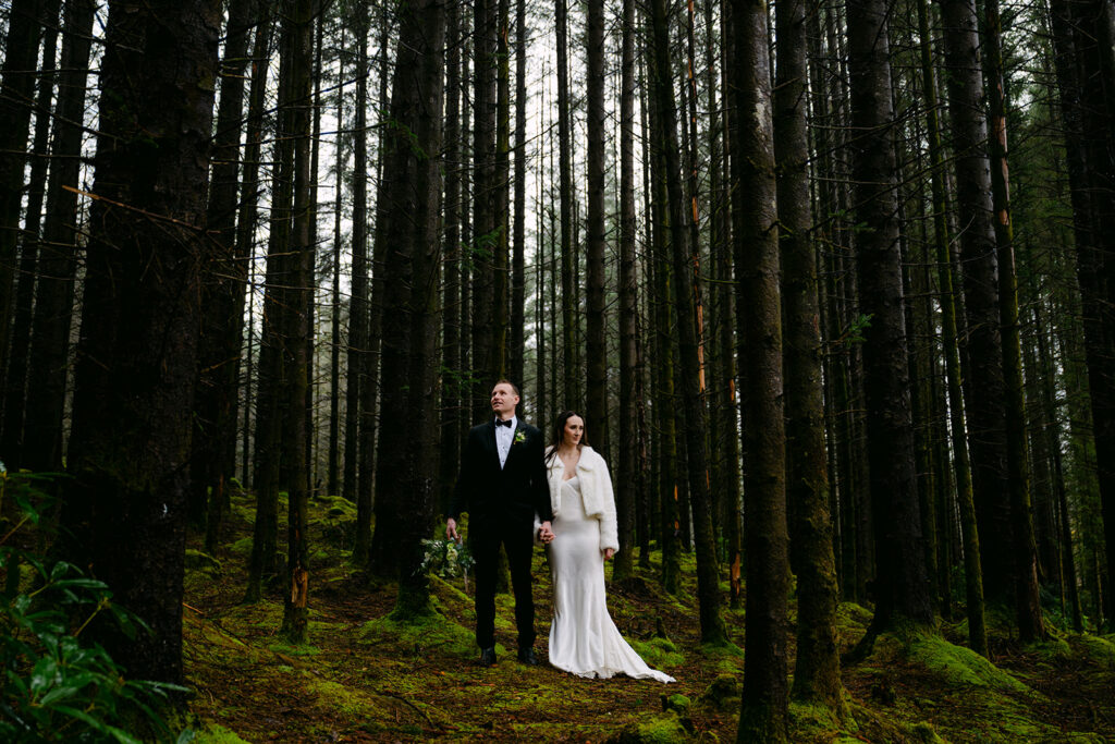 couple stands in glencoe forest during elopement
