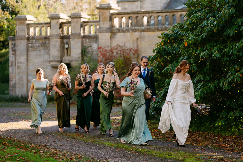 bride and bridesmaids walk to ceremony
