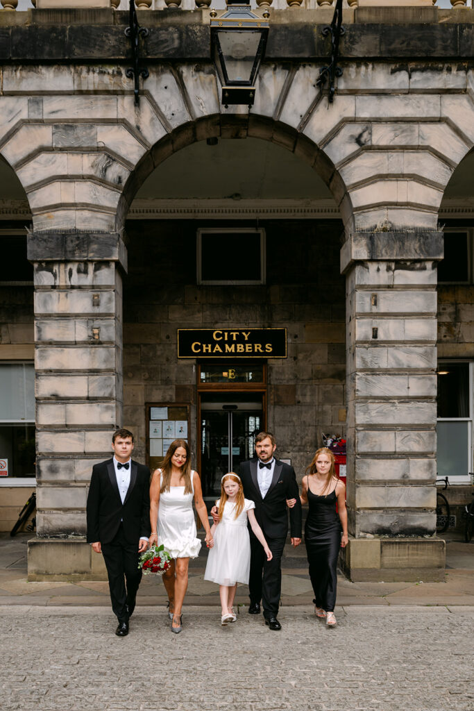 family exits edinburgh city chambers after getting married